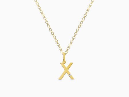 Dije en oro amarillo de 18K letra X moderna con brillante Online now