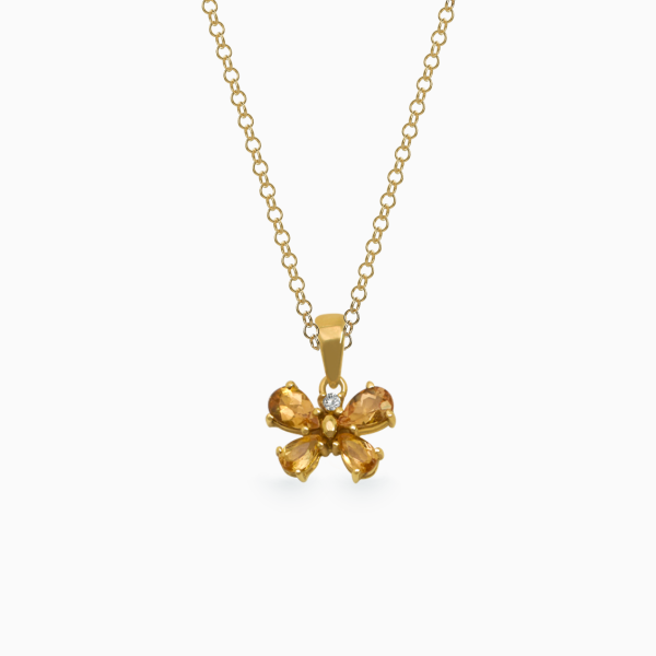 Dije en oro amarillo de 18K mariposa con topacios imperiales Online Sale